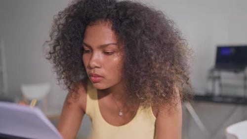 Woman Plays Piano in Home Music Studio