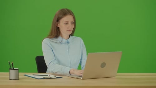 Green Screen Young Pretty Motivated Student Typing on Laptop Working on Internet