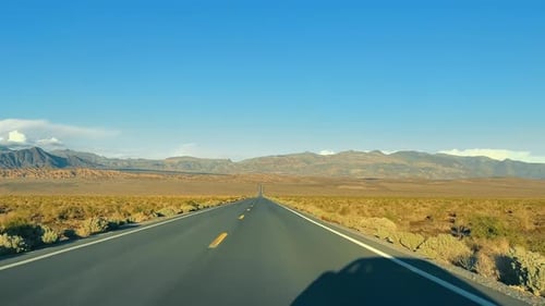 Desert Highway Leading to Mountains Open Desert Road Leading Straight Towards Distant Mountains