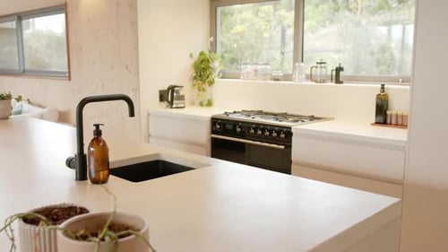 Sleek Modern Kitchen Design with White Countertops