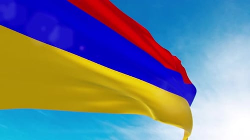 Armenian National Flag Waving in the Wind with Blue Sky