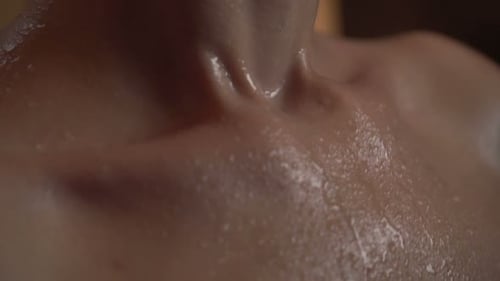 Girl Relaxing in Spa. Drops of Water Flow Down the Skin. Beautiful