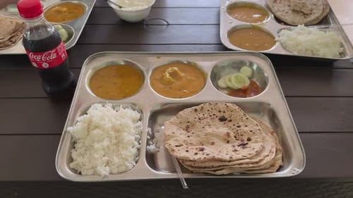 Indian Food in thali with Food platter complete Lunch lunch Meal. North Indian Thali