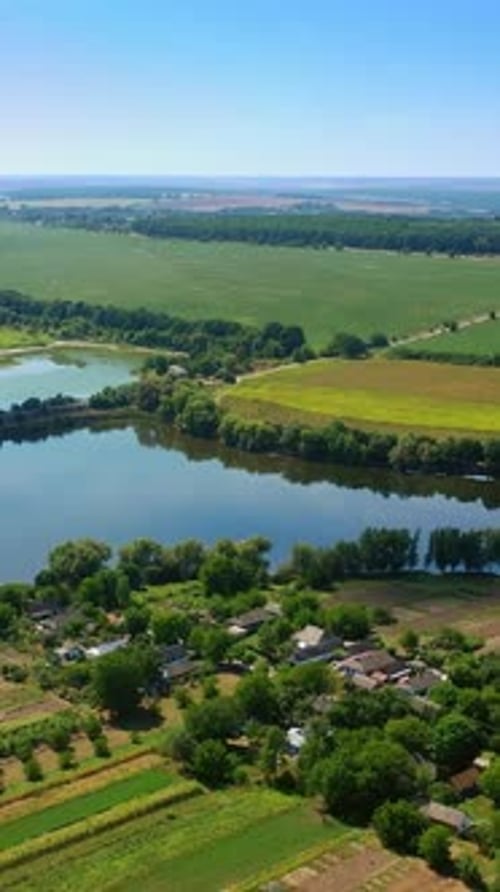 Little river floating in the green fields.
