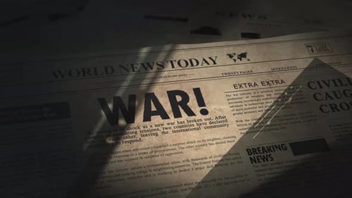 War headline in dramatic unveiling of newspaper article in old vintage daily newspaper in the archiv