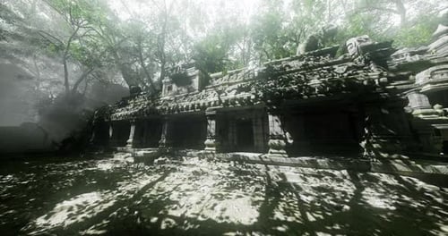 Ancient Temple Ruins Shrouded in Mist and Overgrown Vegetation at Midday