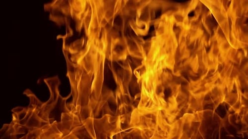 Bright Orange Fire Flames on a Black Background