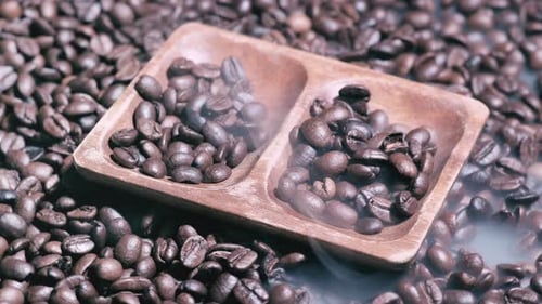 Steaming Coffee Beans on a Wooden Tray
