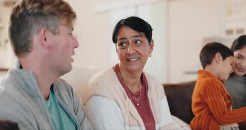 Family Bonding Together at Home in Living Room