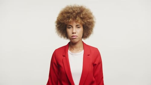 Desperate Businesswoman Raising Head and Looking At Camera