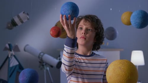 Little astronaut's dream of space flight over earth in a creative nasa school