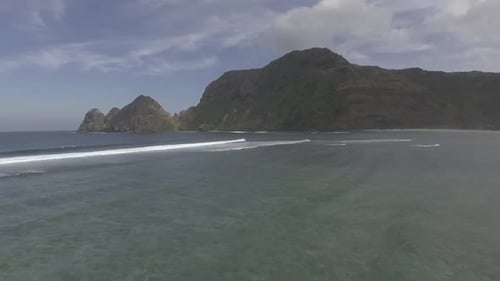 Scenic Ocean Waves Towards Tropical Beach