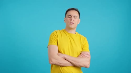 Man Shakes Head While Walking From Side to Side