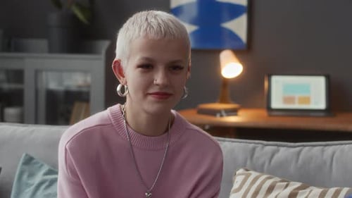 Young Adult Talking to Friend in Home