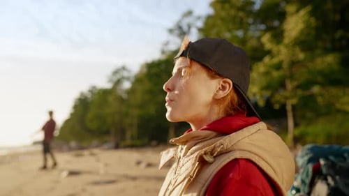 Enjoy Silence and Calmness Woman Tourist Meditating on Sea Shore After Hiking Halt on Coastline