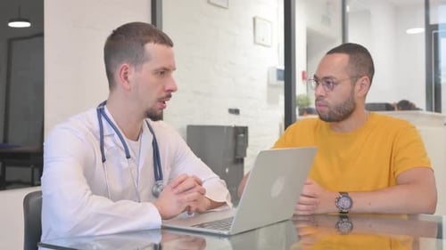 Doctor Consults with Patient in Modern Office