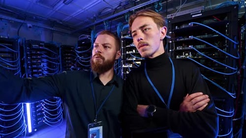 Men Working in a High Tech Server Room