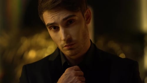 Portrait of Young Business Man Posing at Dark Office. Closeup Gorgeous Man
