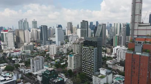 Bangkok Skyline In Daytime With Towering Condos, Corporate Offices, Hotels, And Streets In Thailand.