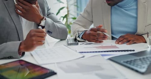 Meeting, paperwork and closeup of businessmen in office talking about financial problem
