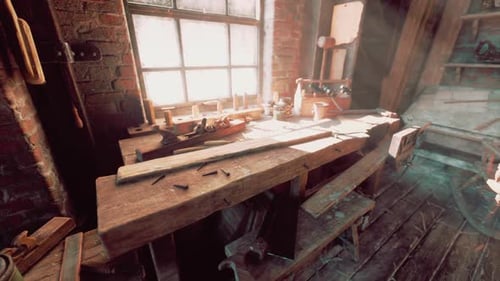 Old Carpentry Workshop with Vintage Tools and Weathered Wooden Surfaces