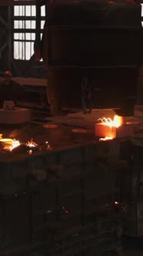 Molten Metal Pouring Into Foundry Mold in Steel Mill Stock Clip