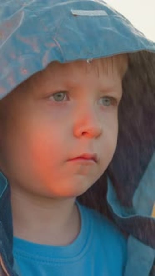 Child Wearing Hooded Jacket Close Up