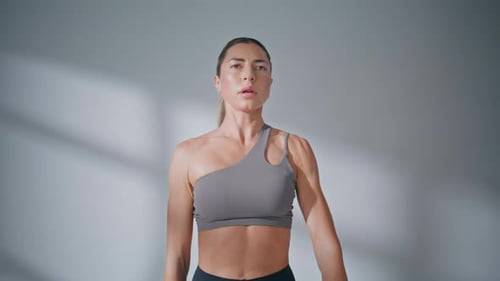 Sportswoman Training Hands Strength Lifting Dumbbells at Studio Woman Workout