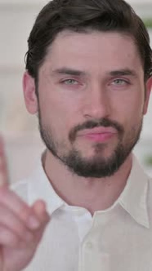 Man Saying No and Waving Finger, Close Up