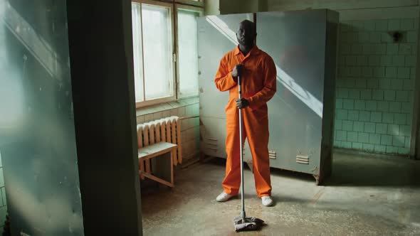 Black Inmate with Mop Posing in Prison Room, People Stock Footage ft ...
