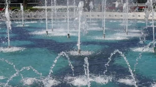 A Captivating and Dynamic Water Fountain Display Featuring a Variety of Colorful Patterns