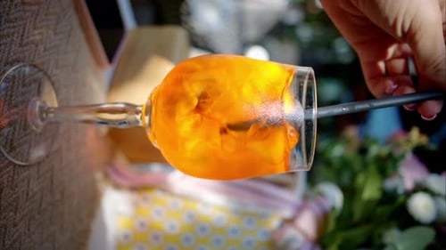 Refreshing Orange Beverage with Straw in Glass