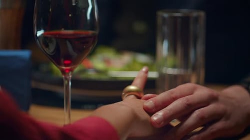 Love Couple Holding Hands at Romantic Restaurant Dinner Date. Multiethnic Lovers Touch