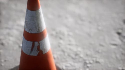 Orange and White Striped Traffic Cone