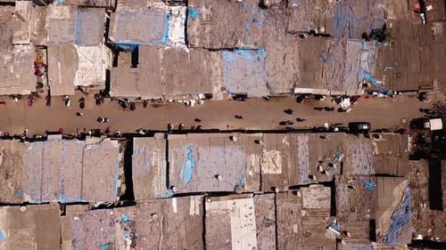 Dharavi Slum in Mumbai, India. Top Down Aerial View of Street and Rooftop of Buildings in Poor Resid