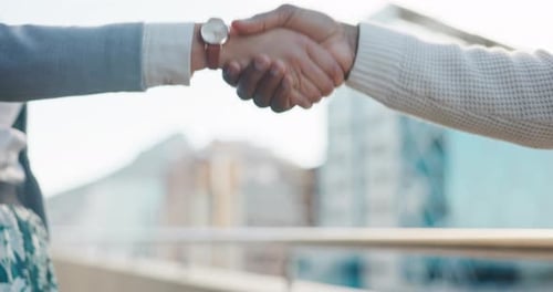 Business, people and handshake in city with welcome, collaboration or meeting for deal