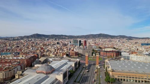 Aerial view of city traffic Plaza de Espana of Squares in Barcelona with Venetian Towers