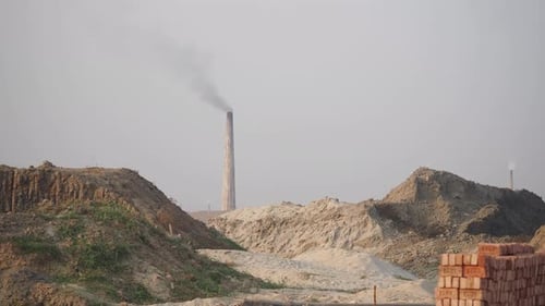 Industrial Landscape with Emissions and Construction Materials