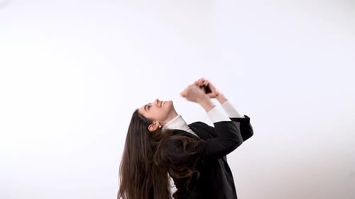 Excited Woman Celebrates Good News on Phone