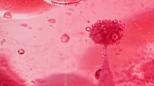 Abstract Close Up of Red Bubbles Rising