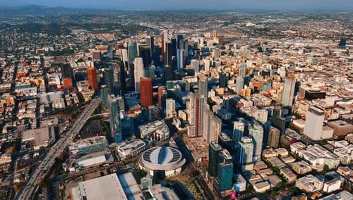 Vast Lost Angeles panorama with downtown in the center. Sunny view of the city at daytime.
