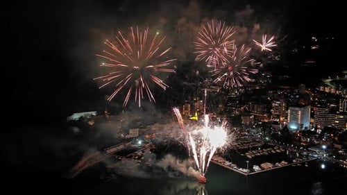Fireworks with Colorful Lights Over Sea