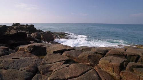 Crashing Waves on Coast Sea Spray Over Boulders Tranquil Nature Ocean Surf Hits Rocky Shoreline