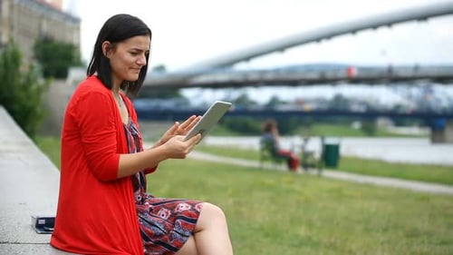 Shocked Happy Woman Browsing Internet on Tablet in City 20s