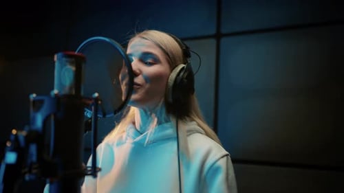 Modern Sound Studio for Recording Music Portrait of Singing Woman Singer Record of Soundtrack