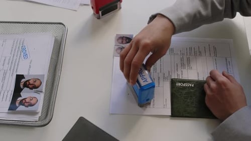 Stamping 'Approved' on Visa Application Form