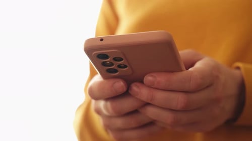 Person using cell phone close up