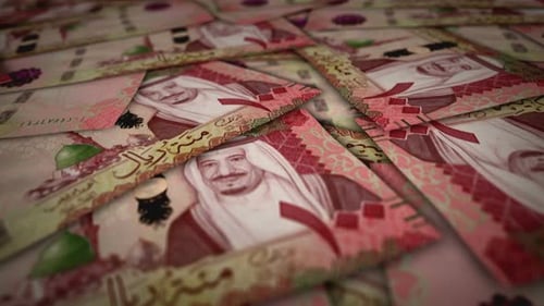 Saudi Arabia Rial 100 banknote flying over money surface