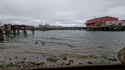 Docked boat at a wooden pier