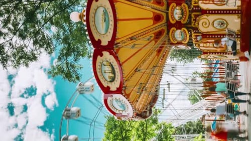Vertical Footage Rotating High Speed Carousel Merrygoround In City Amusement Park
